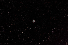 NGC 6720 (Messier 57), the Ring Nebula is a planetary nebula in the constellation Lyra. FOV is approximately 54' x 36'. This is twenty-eight 300 second guided subs taken from my backyard on September 19th, 2021. A Canon Sony A6600 camera at ISO3200; iOptron CEM40G mount with a Celestron 127mm Mak-Cas f/12, FL 1500mm.